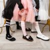 Knee-high socks with straps for girls
